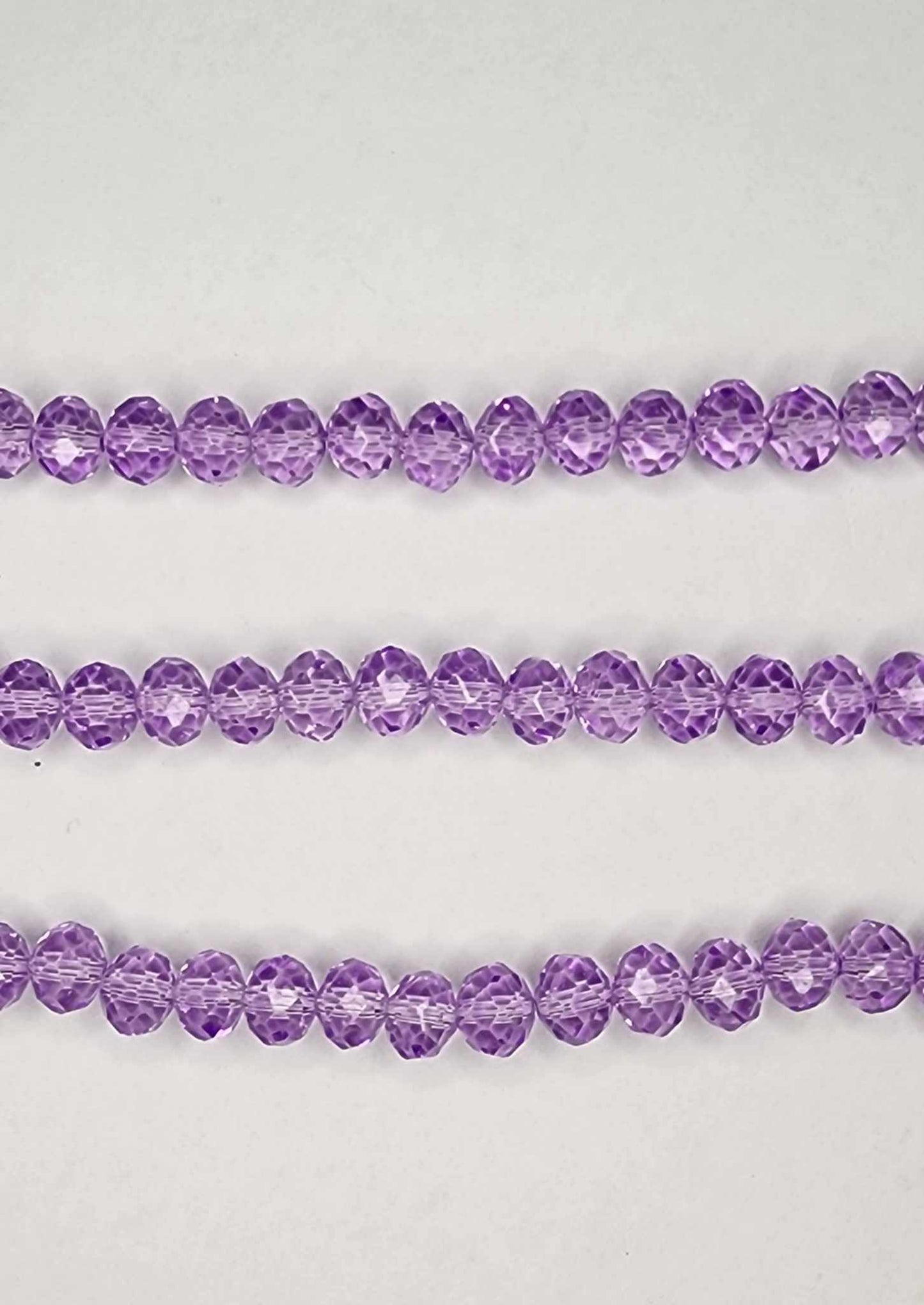 Violet strand of glass beads