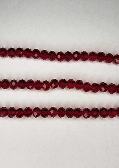 Dark red strand of glass beads