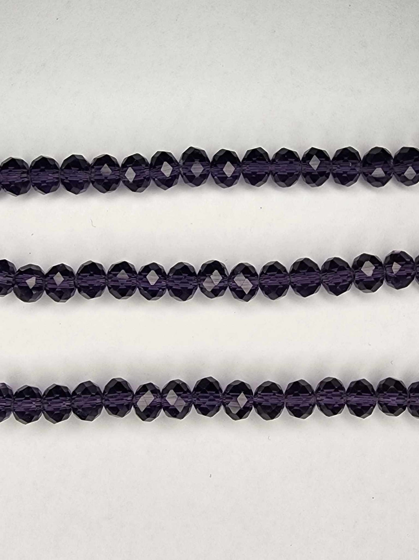 Dark purple Strand of Glass beads